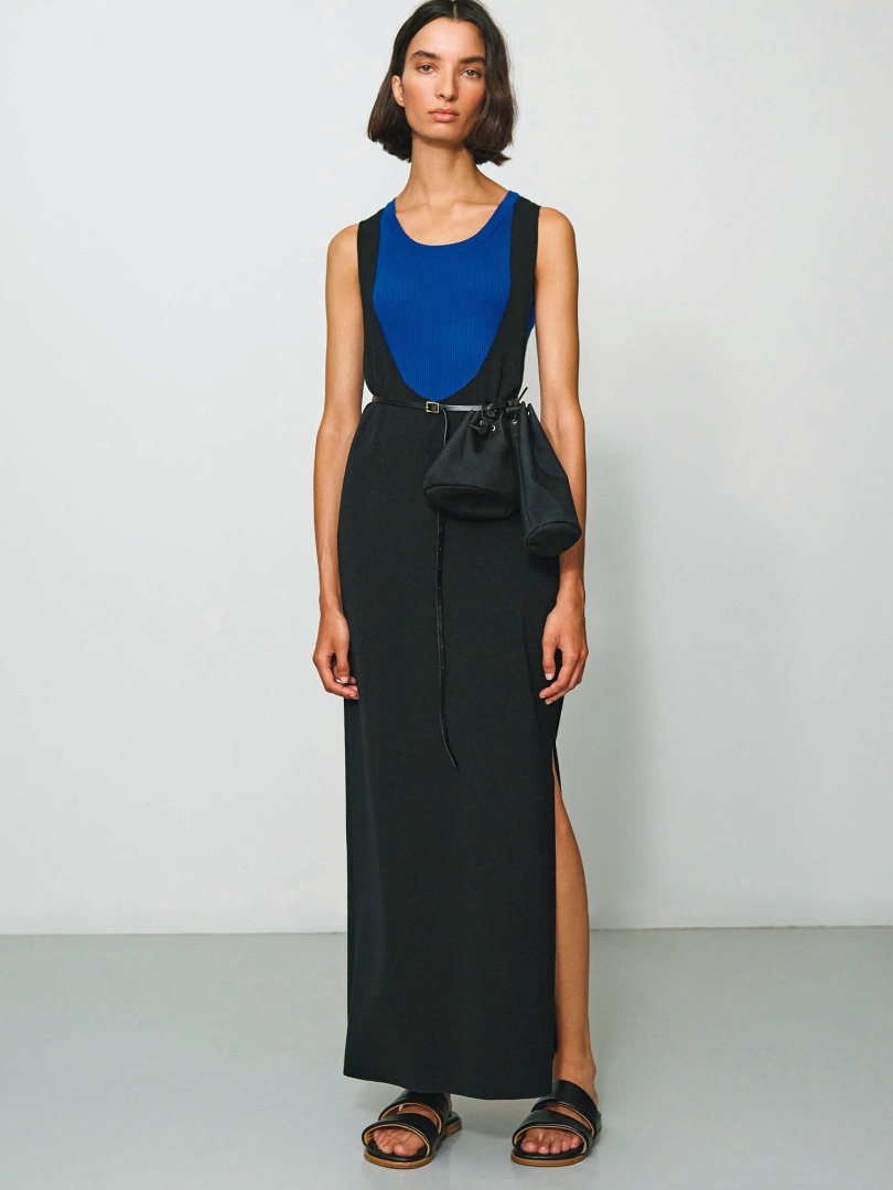 Emma wears Wool Recycle Polyester High Gauge Rib Knit Dress in Black, Giza High Gauge Rib Knit Tank in Blue